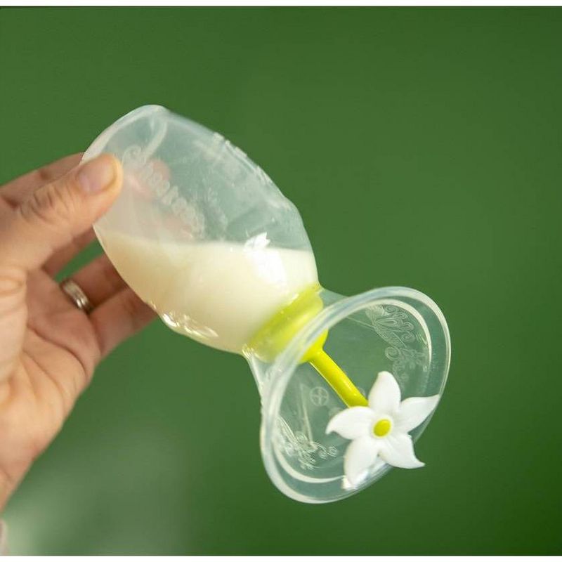 Haakaa Breast Pump without Suction Base and White Flower Stopper - 4oz