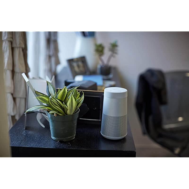 The  SoundLink Revolve, the Portable Bluetooth Speaker with 360 Wireless Surround Sound, Lux Gray &  SoundLink Revolve Charging Cradle Black