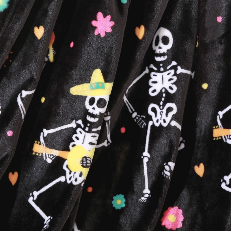 50"x60" Dancing Skeletons Printed Halloween Throw Blanket Black - Better Living