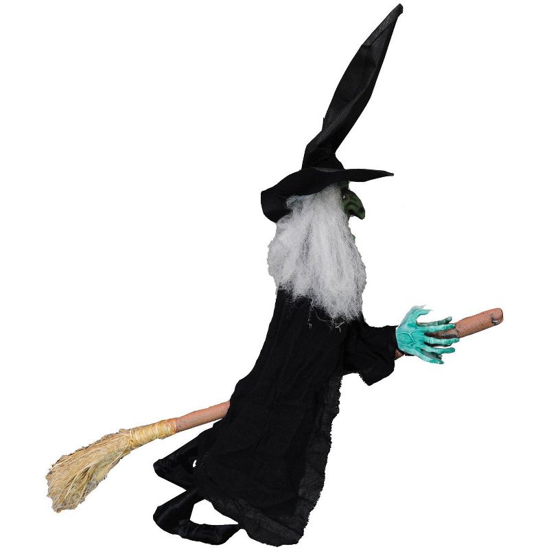 Halloween Witch Hanging On A Broom