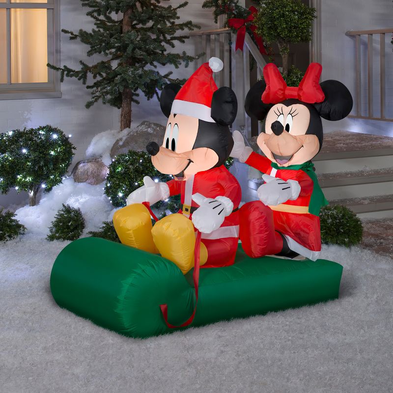 Gemmy Christmas Airblown Inflatable Mickey and Minnie on Sled Scene Disney, 4.5 ft Tall