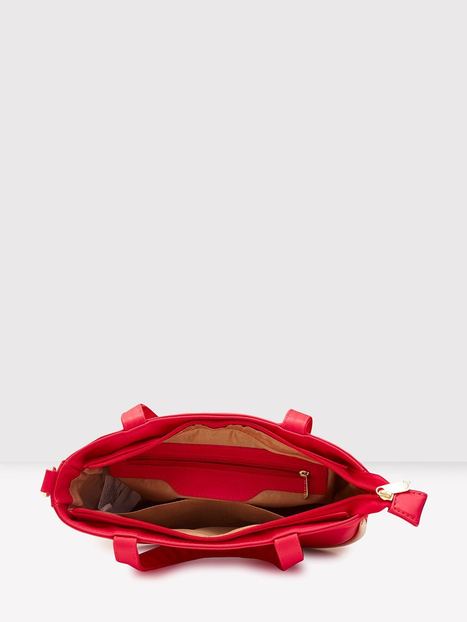 Caprese Magenta Solid Medium Handbag