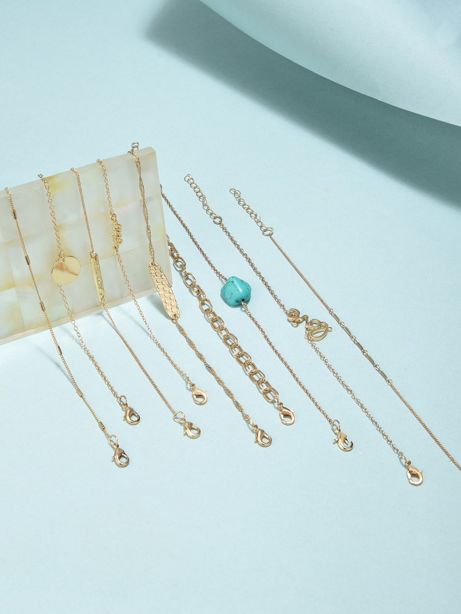 Zaveri Pearls Gold Tone Set of 9 Contemporary Stackable Bracelets-ZPFK11514