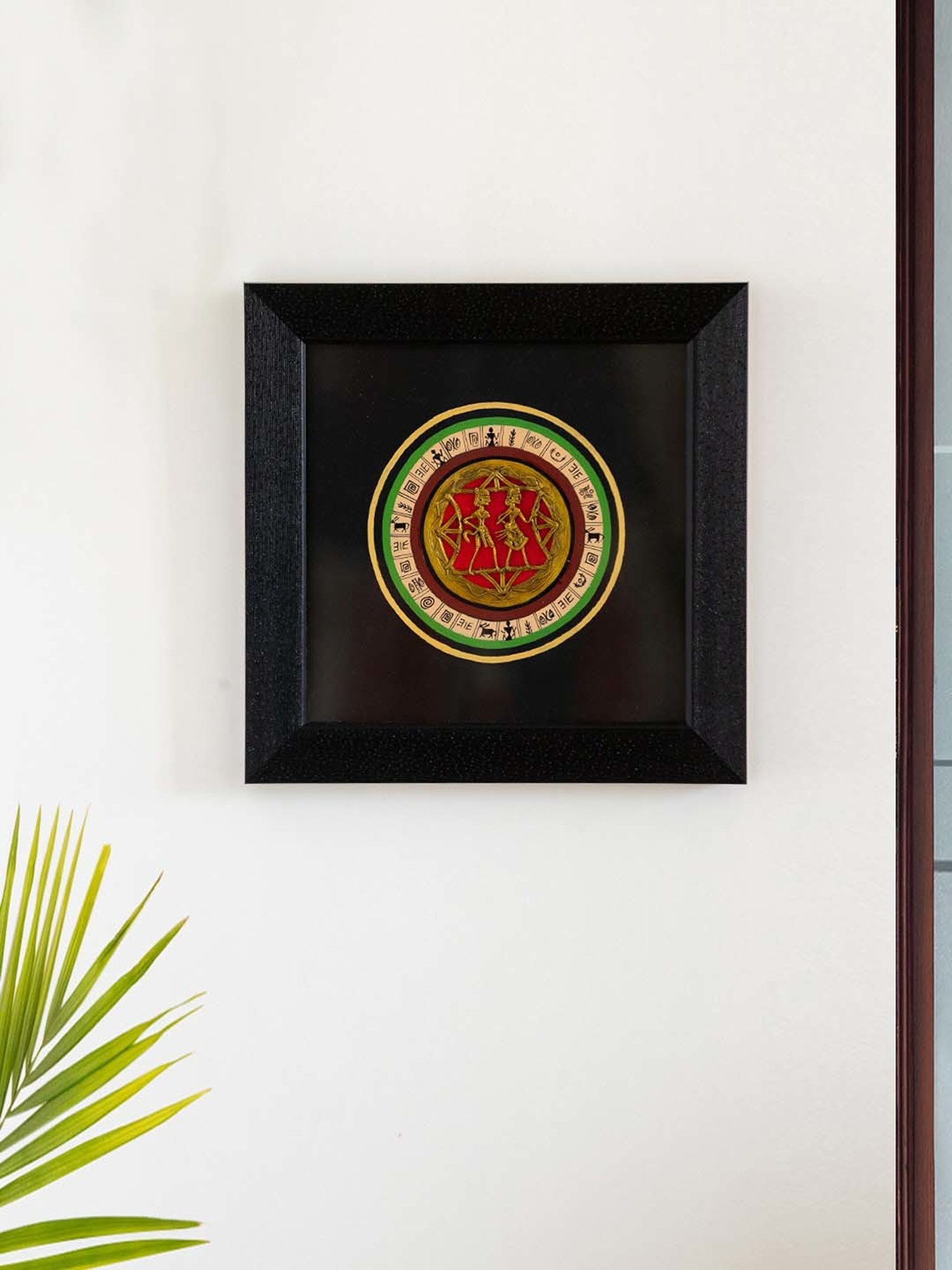 ExclusiveLane Black & Golden Acrylic Dhokra-Warli Dance Handcrafted Wall Decor