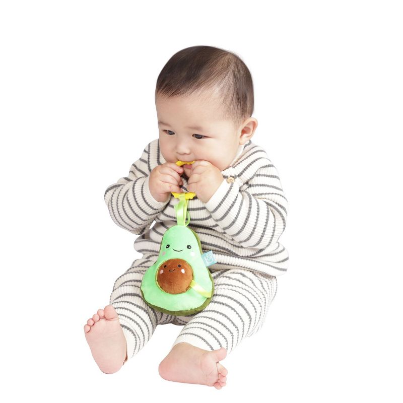 Manhattan Toy Mini-Apple Farm Avocado Baby Travel Toy with Rattle, Chime, Crinkle Fabric & Teether Clip-on Attachment