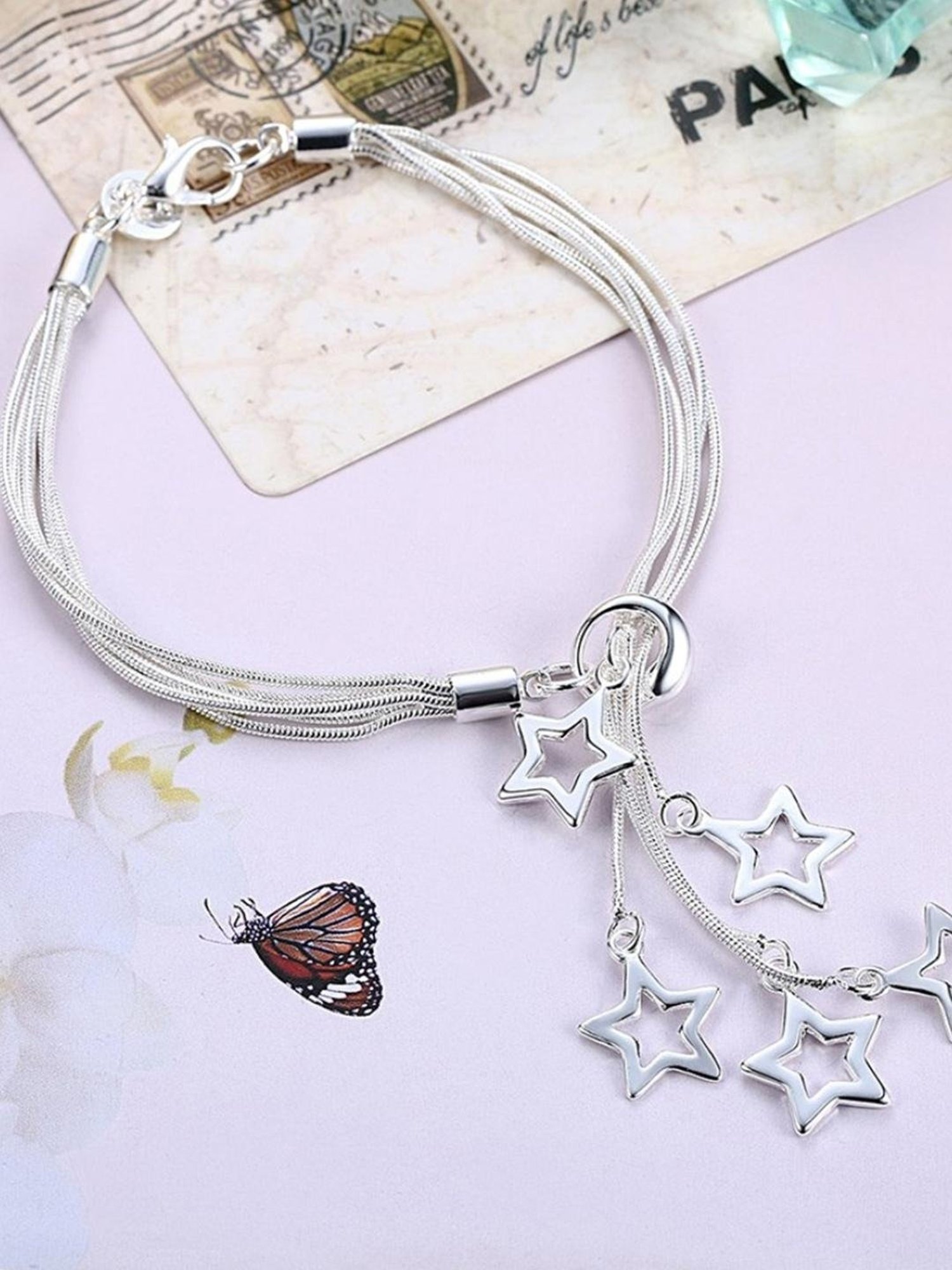 YouBella Silver-Plated Crystal Charms Bracelet