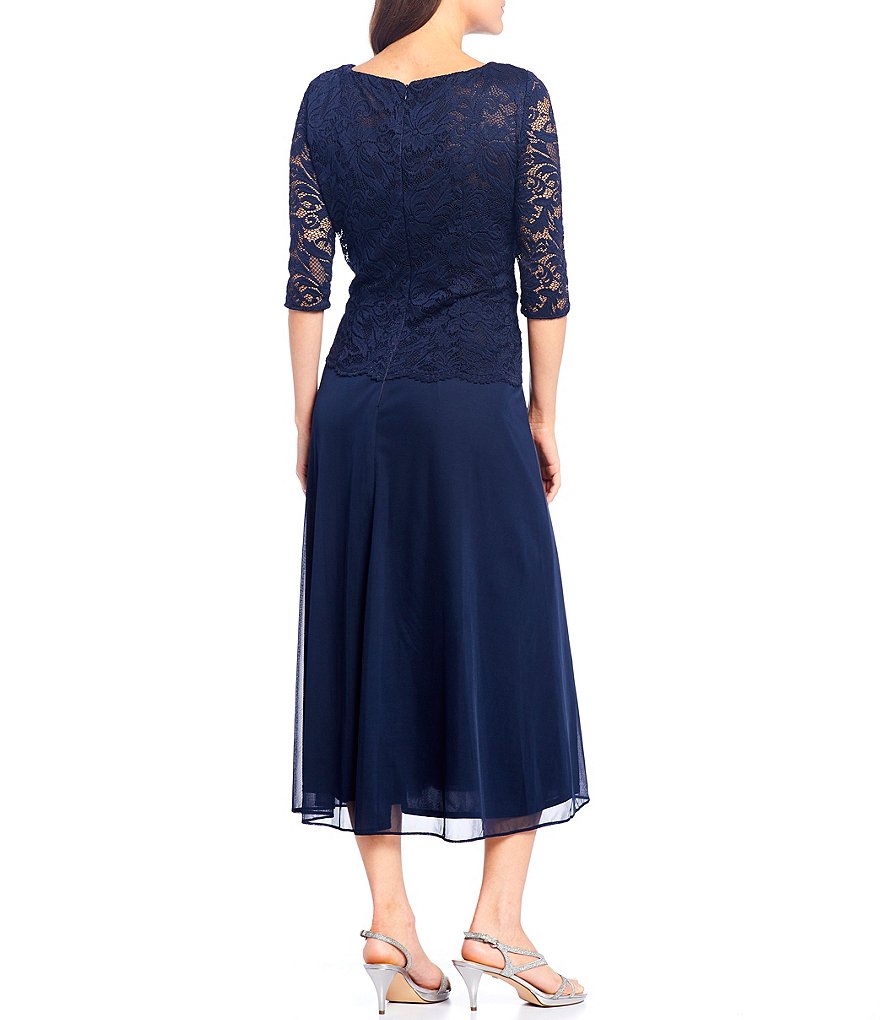 Le Bos Round Neck 3/4 Sleeve Stretch Lace Bodice Ruched Waist With Broach Detail Tea Length Gown