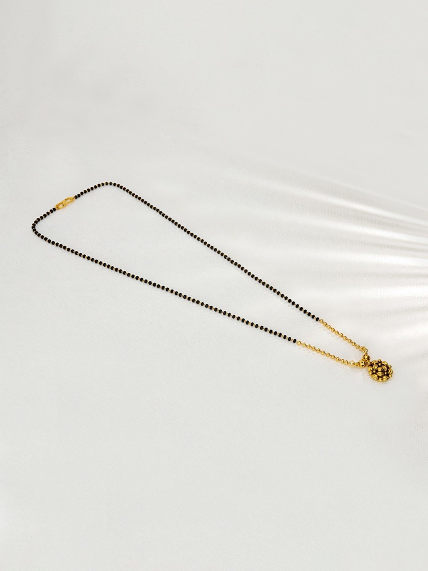 P.N.Gadgil Jewellers 22k Engraved Floweret Gold Mangalsutra