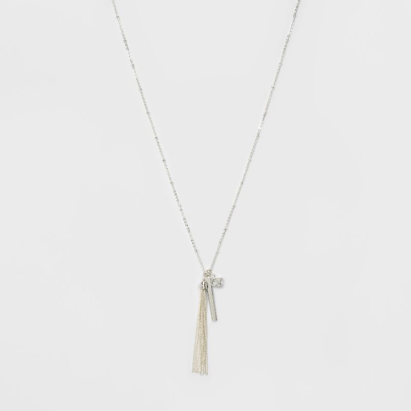 Caged Cubic Zirconia, A Smooth Bar & A Tassel Three Pendant Long Necklace - A New Day™ Silver
