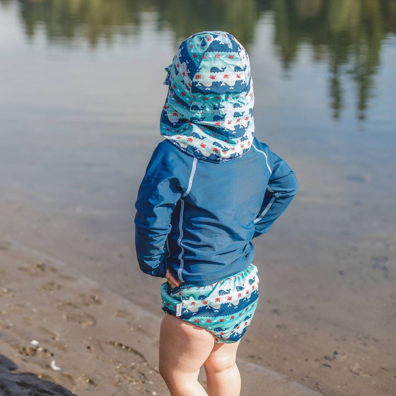 i play by green sprouts Baby Boys' Whale Stripe Reversible Flap Swim Hat - Navy/Aqua/Gray 0-6M