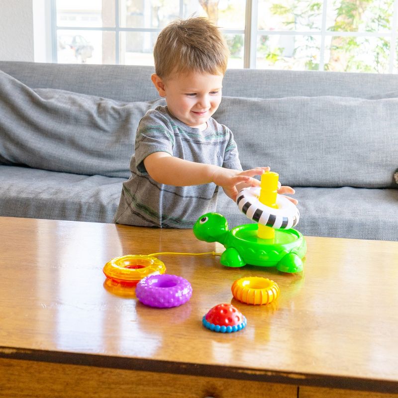 The Learning Journey Pull Along Stacking Turtle includes 5 stacking rings