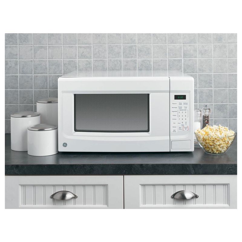 GE 1.4 Cubic Foot 1100 Watt Countertop Microwave, White (Manufacturer Refurbished)