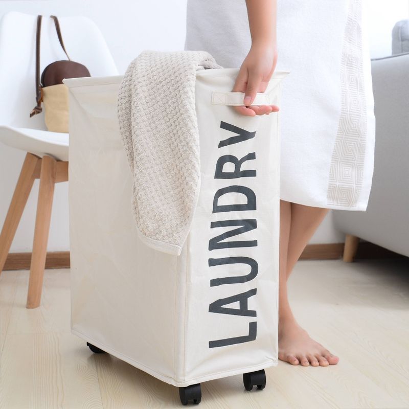 Danya B. Collapsible Waterproof Folding Laundry Hamper on Wheels White