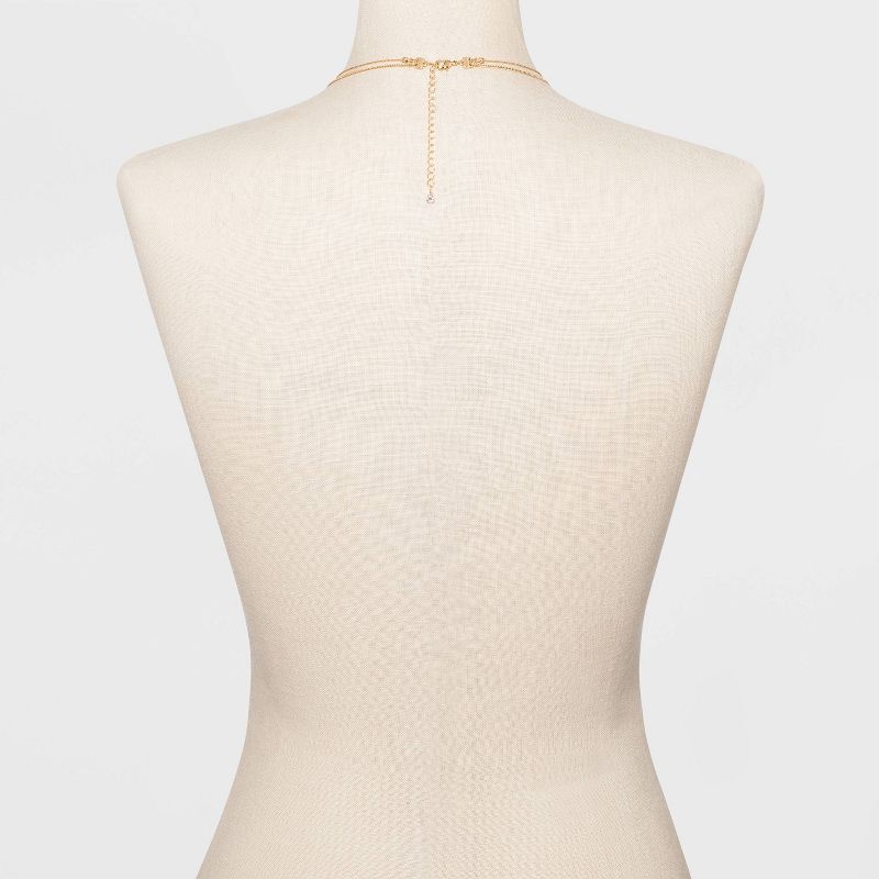 Filigree Disc with Glitter Layered Necklace - A New Day™ Gold