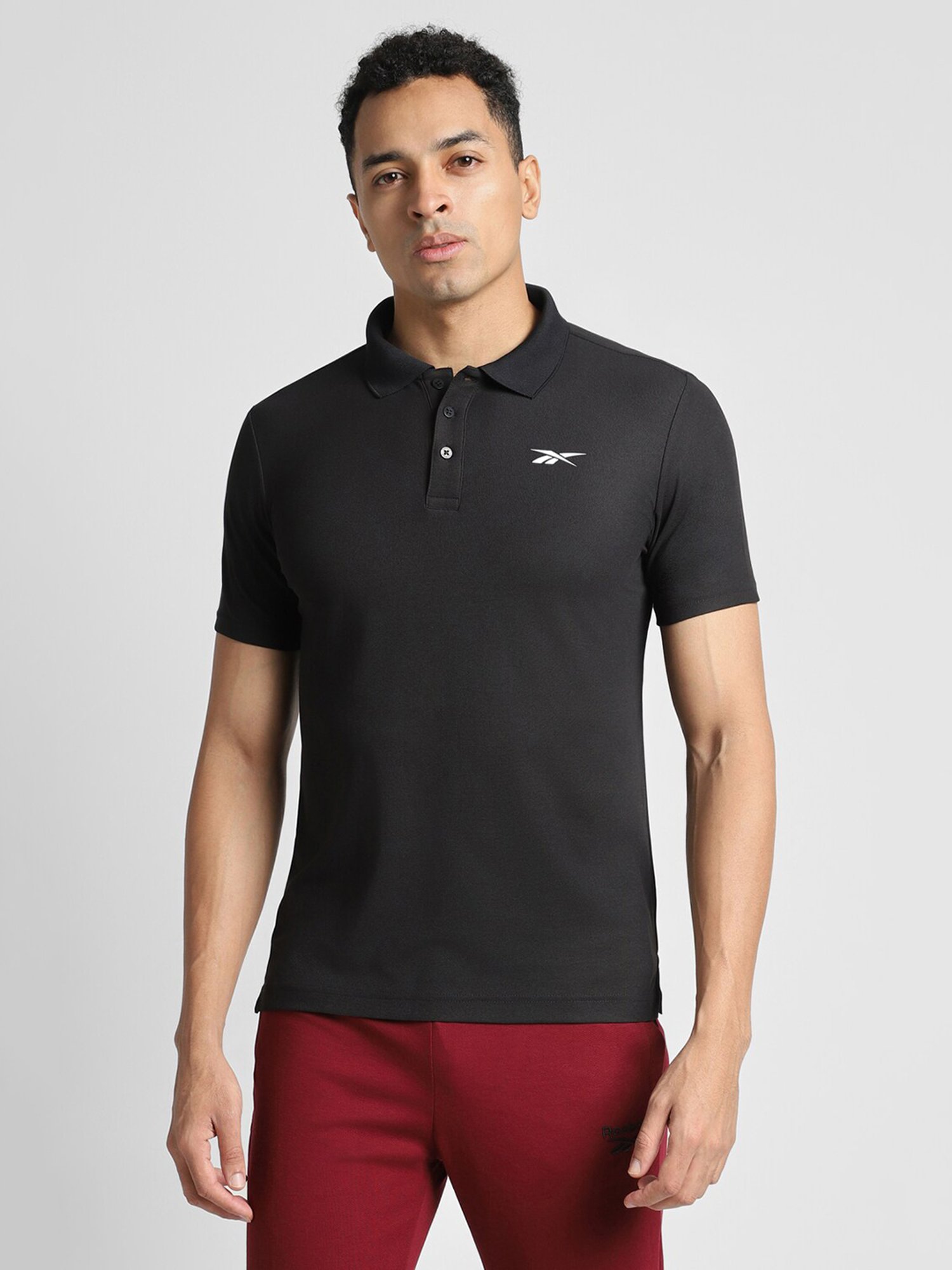 Reebok Black Polyester Slim Fit Solid Polo T-Shirt