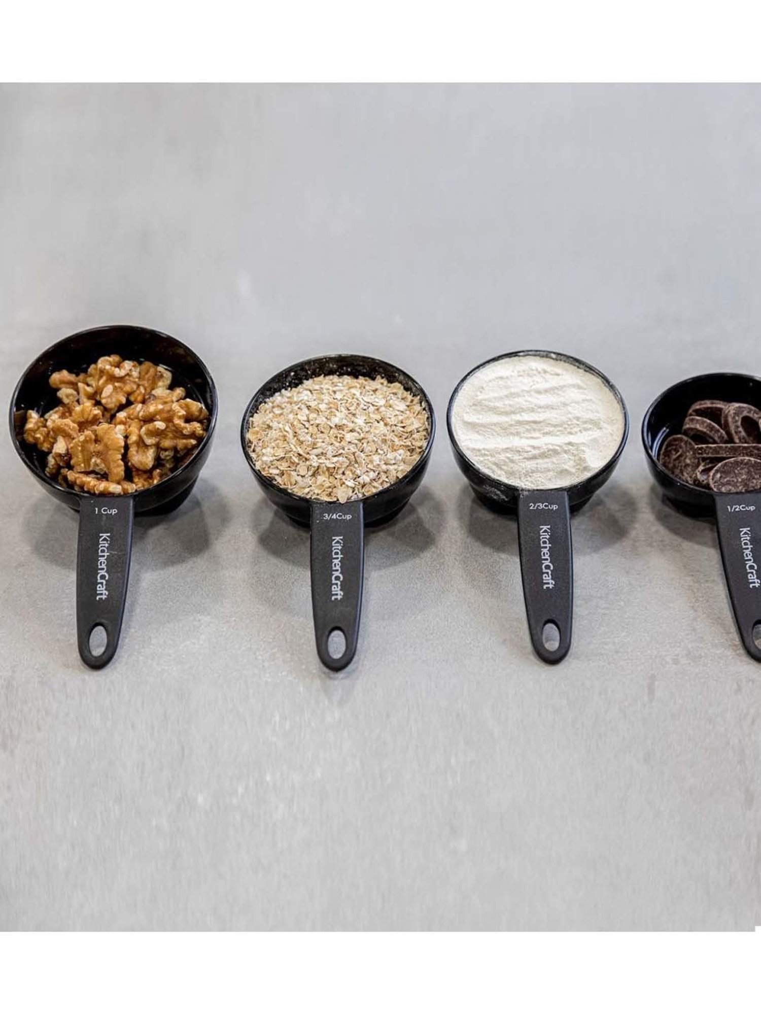 KitchenCraft Black Plastic Magnetic Measuring Cup - Set of 4