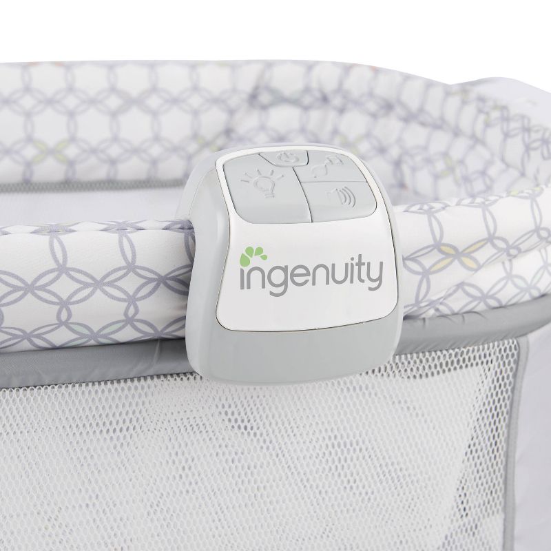 Simmons Kids' Silent Auto Gliding Deluxe Bassinet - Embossed Paisley
