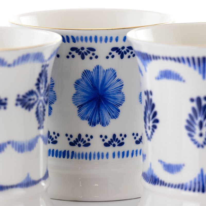 Meritage Navy 12 Piece 13.2 Ounce Fine Ceramic Cup Set in White with 4 Assorted Designs