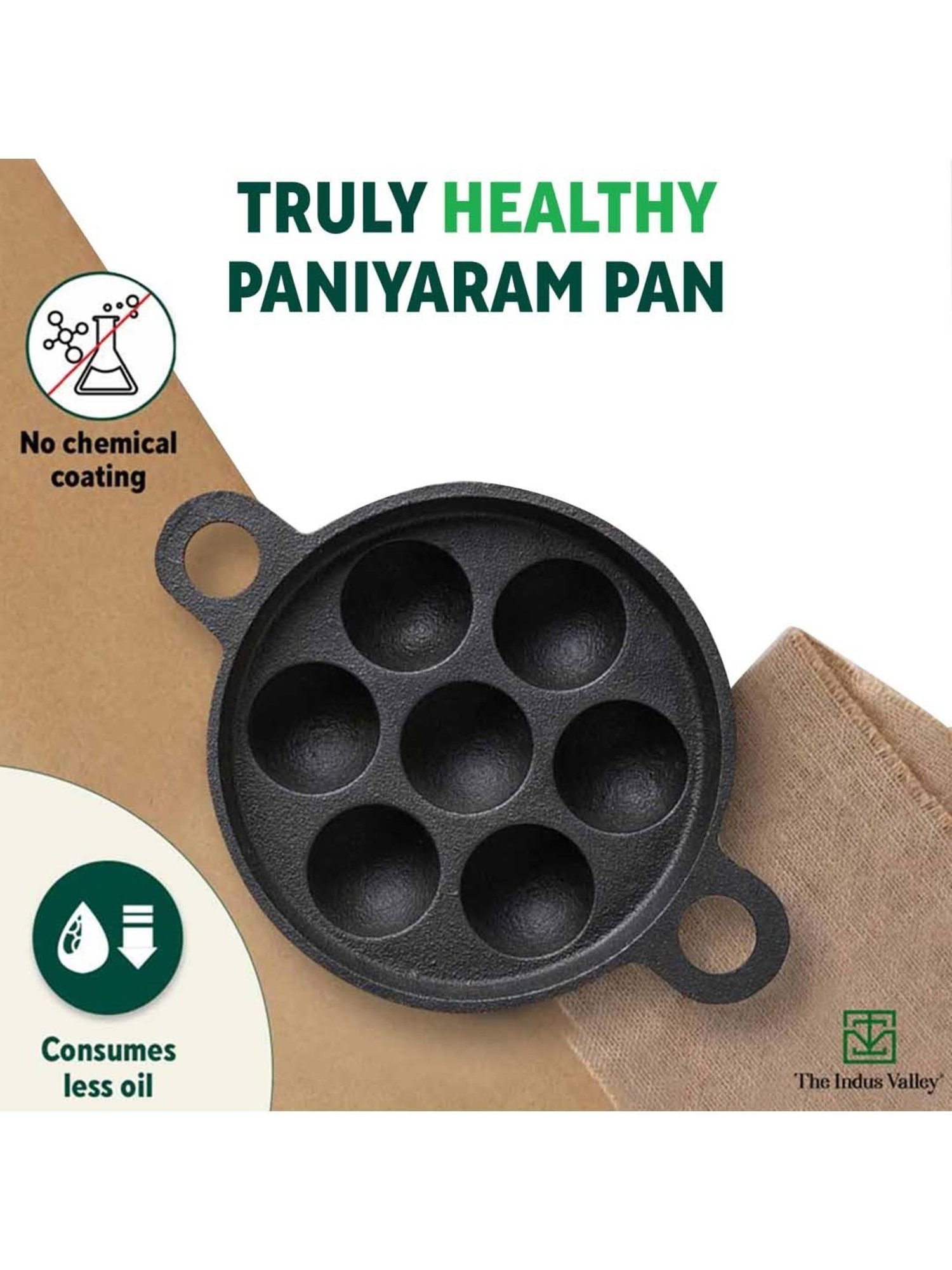 The Indus Valley Black Cast Iron 19cm 7-Pit Paniyaram Pan with Free Wooden Picker