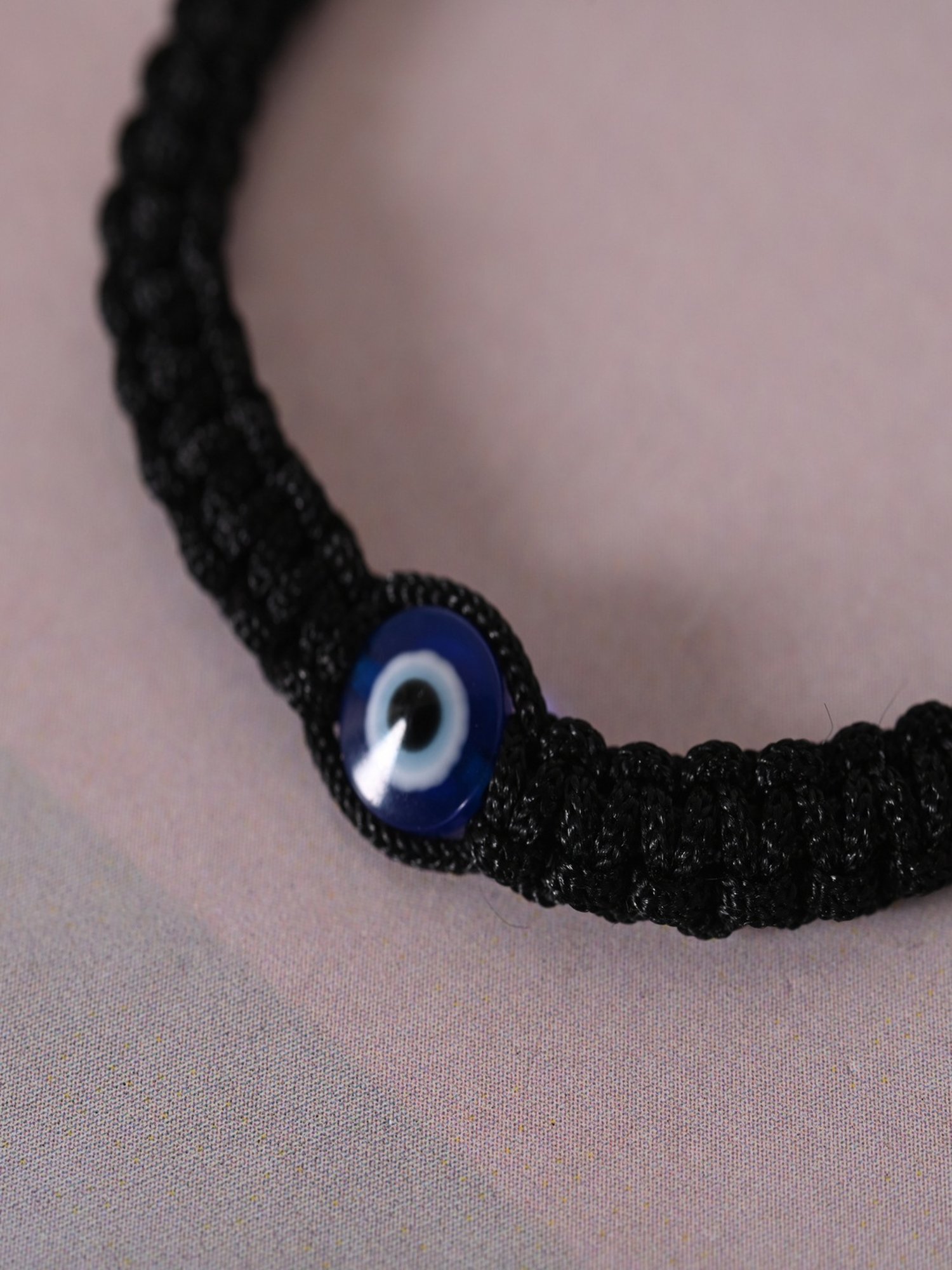NVR Black Evil Eye Rakhi with Roli Chawal