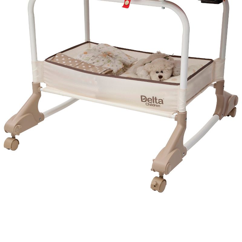 Simmons Kids' Silent Auto Gliding Deluxe Bassinet - Embossed Paisley