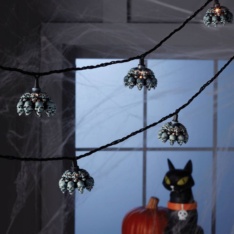 10ct Halloween Plastic Stacked Skulls Clear Bulb Novelty String Lights - Hyde & EEK! Boutique™