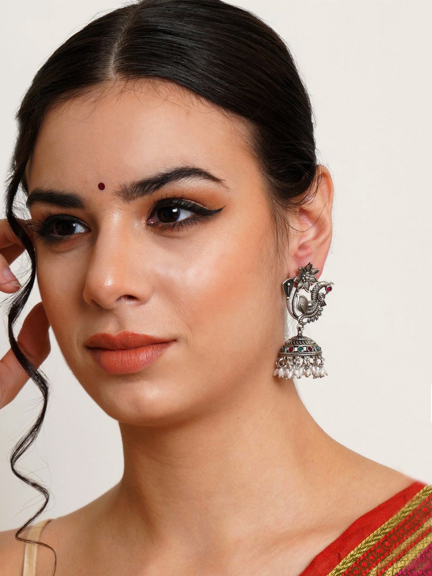 Karatcart Oxidized Silver Peacock Shape Jhumki Earrings