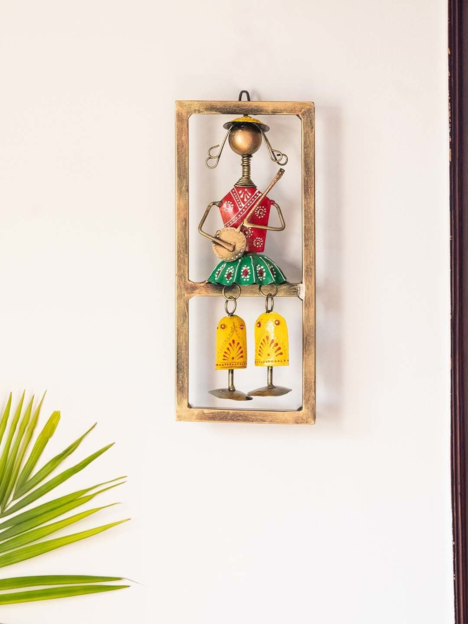 ExclusiveLane Hand-painted Multicolor Iron Rajasthani Sitar Artist Wall Hanging