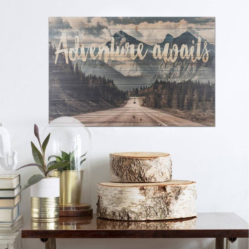 24" x 36" Adventure Awaits Mountains Print on Planked Wood Wall Sign Panel - Gallery 57