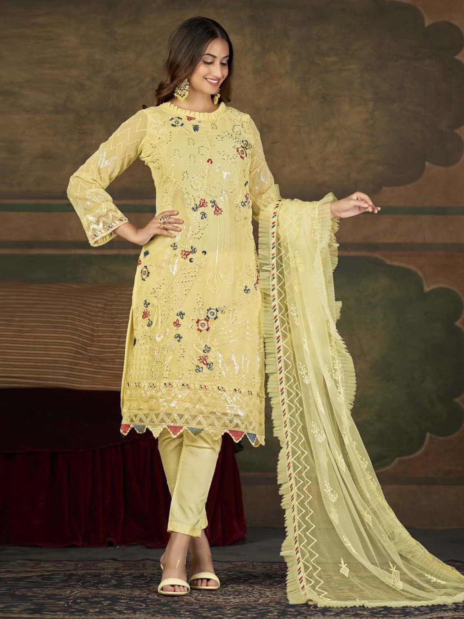 Warthy Ent Yellow Embroidered Semi Stitched Dress Material