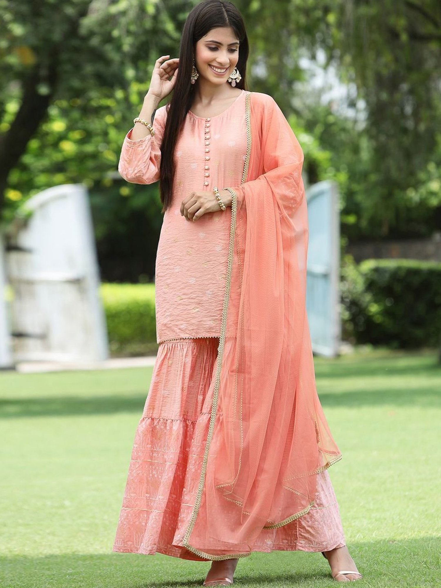 Juniper Peach Ethnic Motif Printed Viscose Muslin Kurta Sharara & Net Dupatta Set