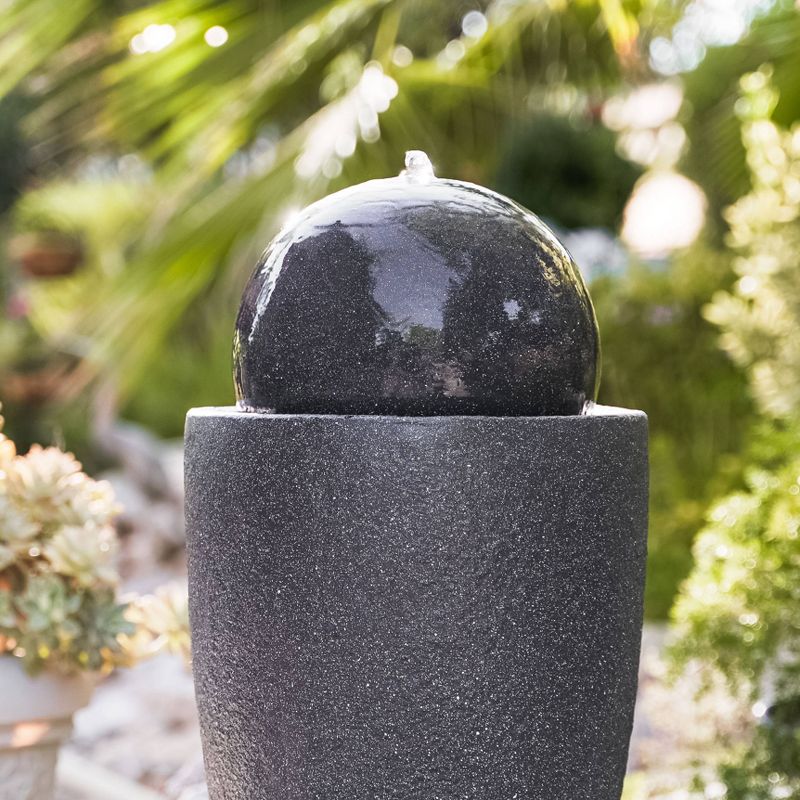 25.6" Indoor/Outdoor Round Modern Stone Textured Water Fountain with LED Lights Black - XBrand