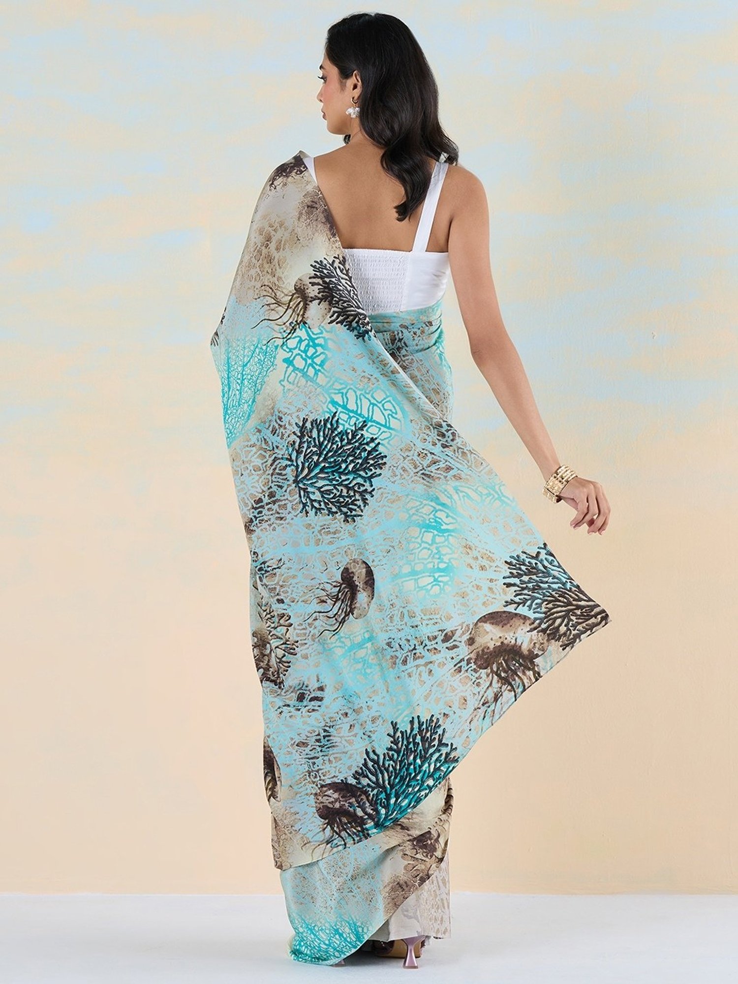 navyasa by liva Blue & Brown Printed Saree With Unstitched Blouse