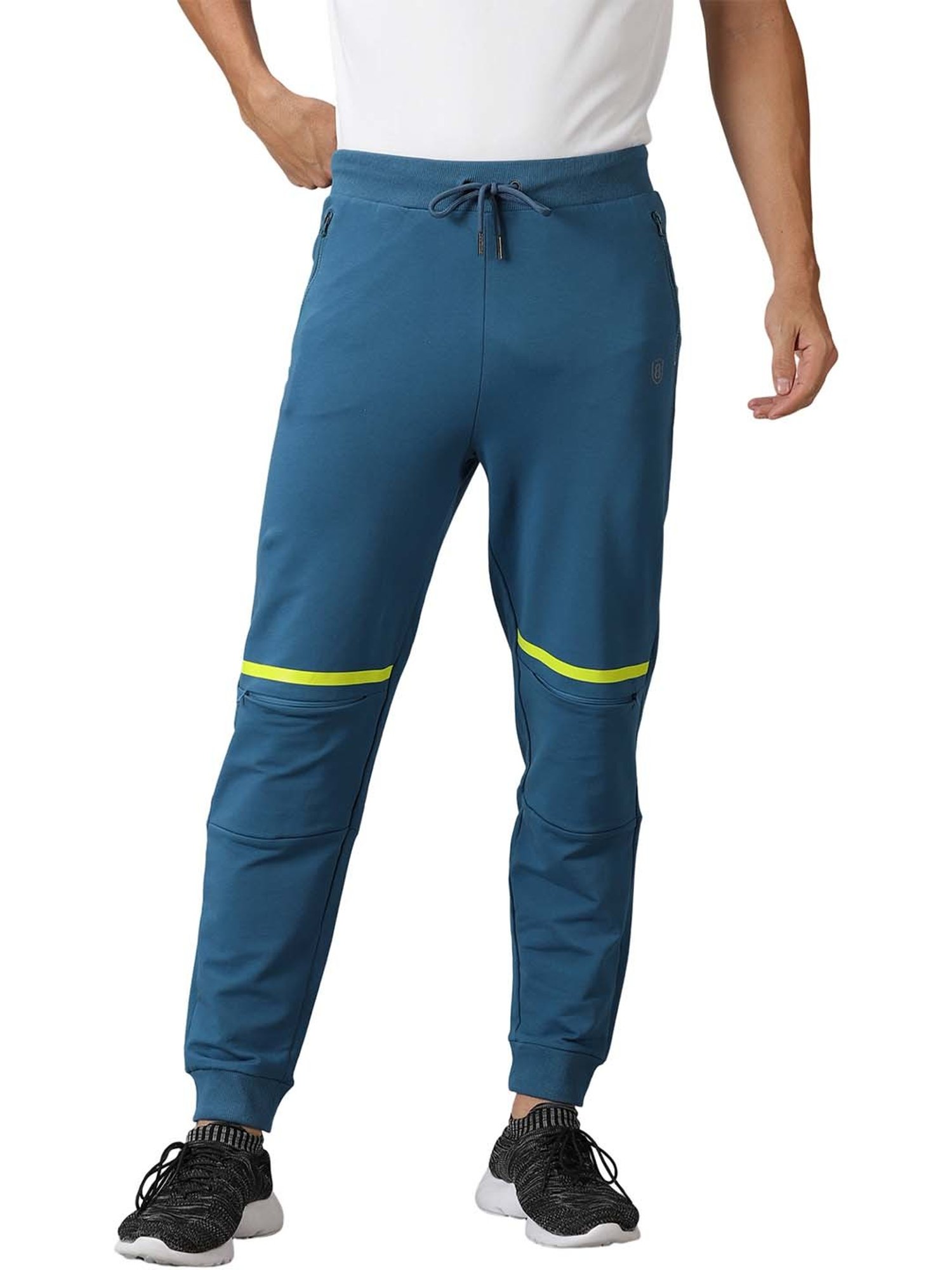 DOMIN8 Men Solid Training Track Pants With Drawstring Waist & Zipper Pockets