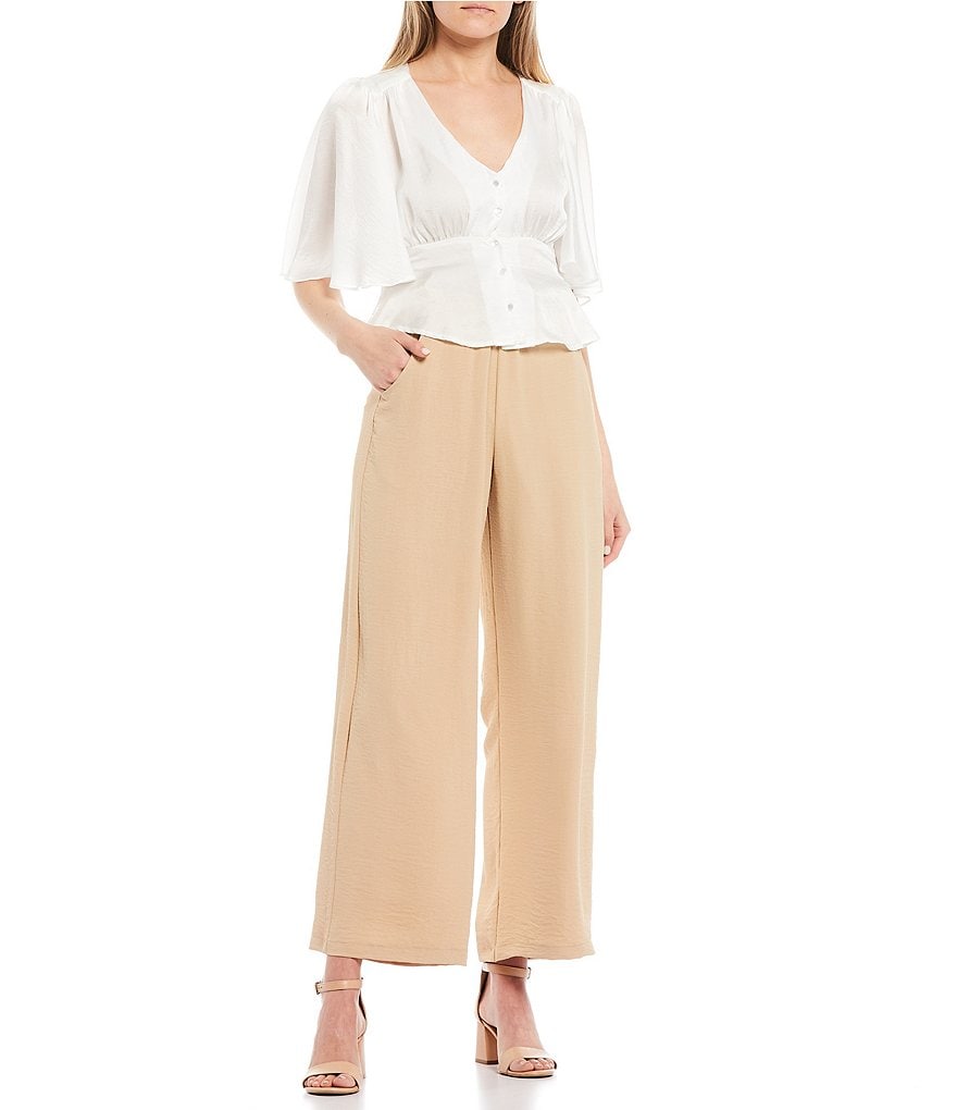 Evolutionary Satin Wash Button Front Peplum Top