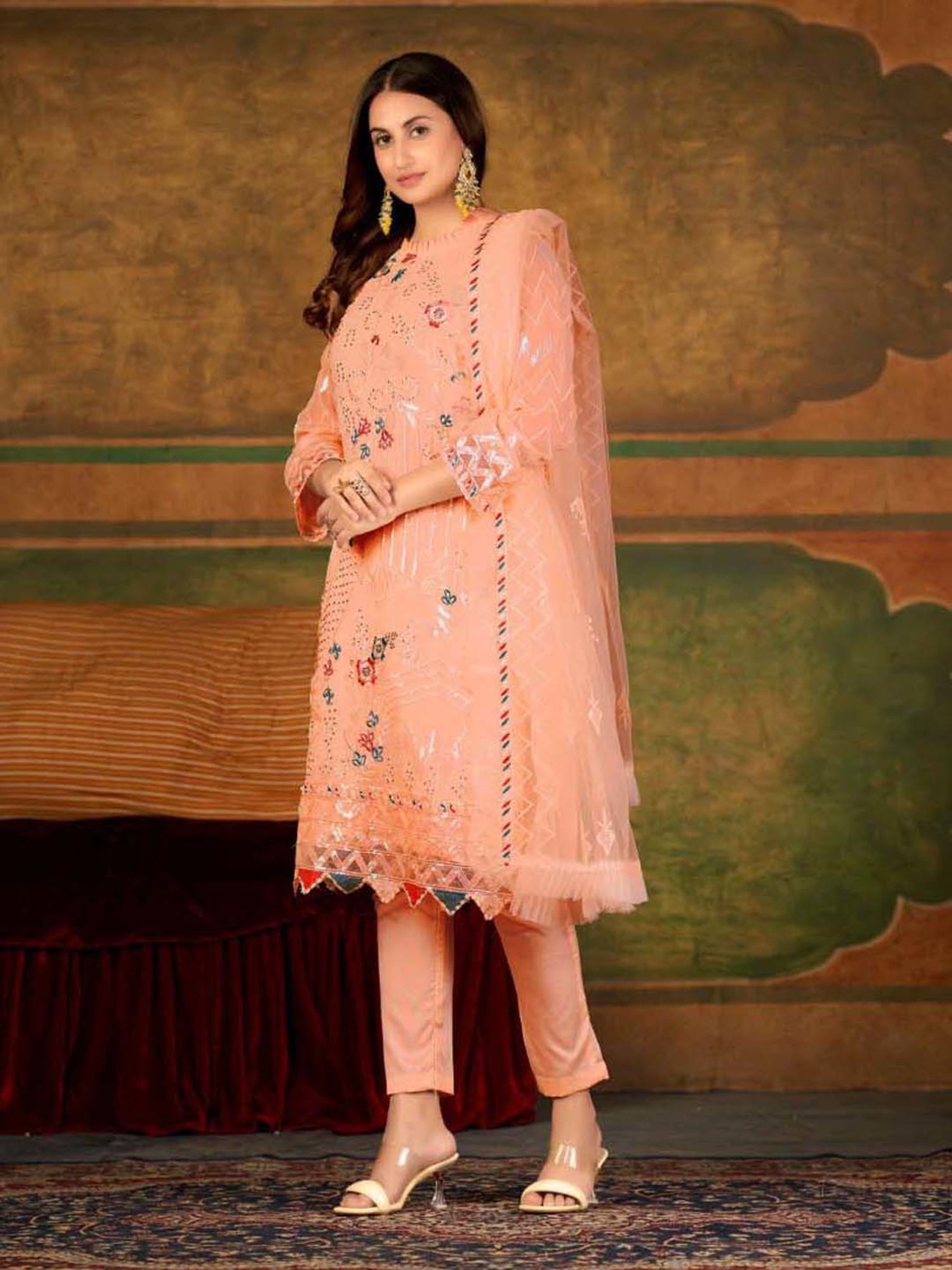 Warthy Ent Orange Embellished Semi Stitched Dress Material