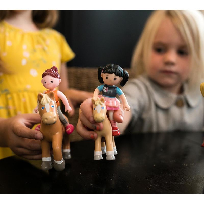 HABA Little Friends Lara - 4" Bendy Doll Figure with Black Pigtails