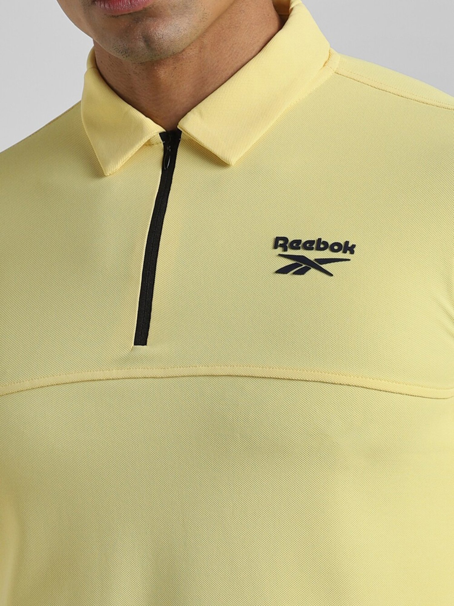 Reebok Yellow Polyester Slim Fit Solid Polo T-Shirt