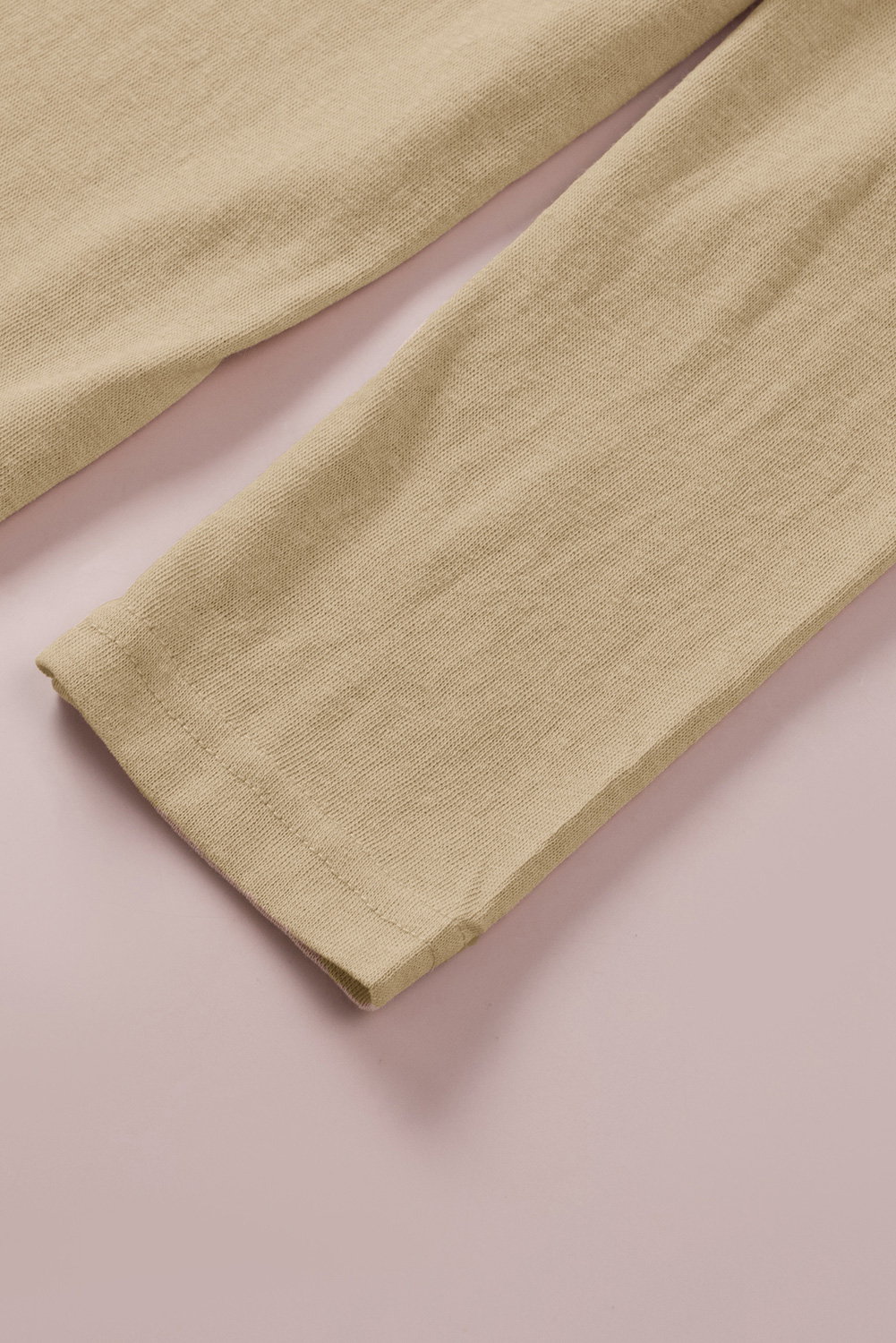 Karen Kane Long Sleeve Asymmetrical Hem Round Neck Sweater