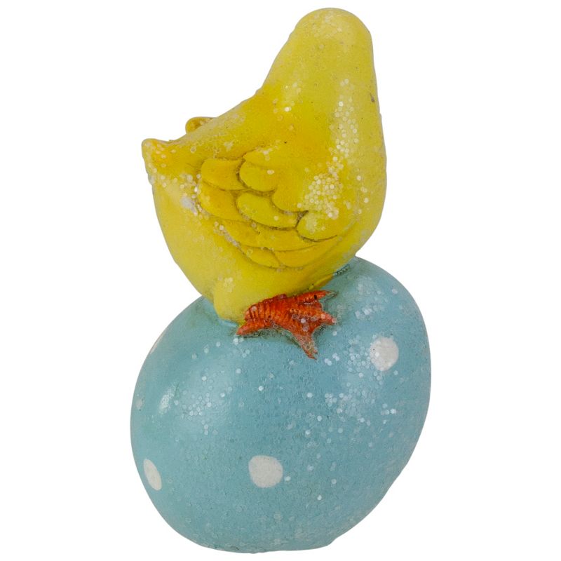 Darice 4" Yellow Chick Perched on a Blue Easter Egg Tabletop Decor