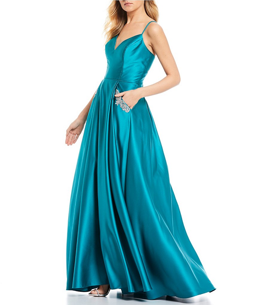 Blondie Nites Spaghetti Strap Lace-Up Back Beaded Pockets Satin Ball Gown