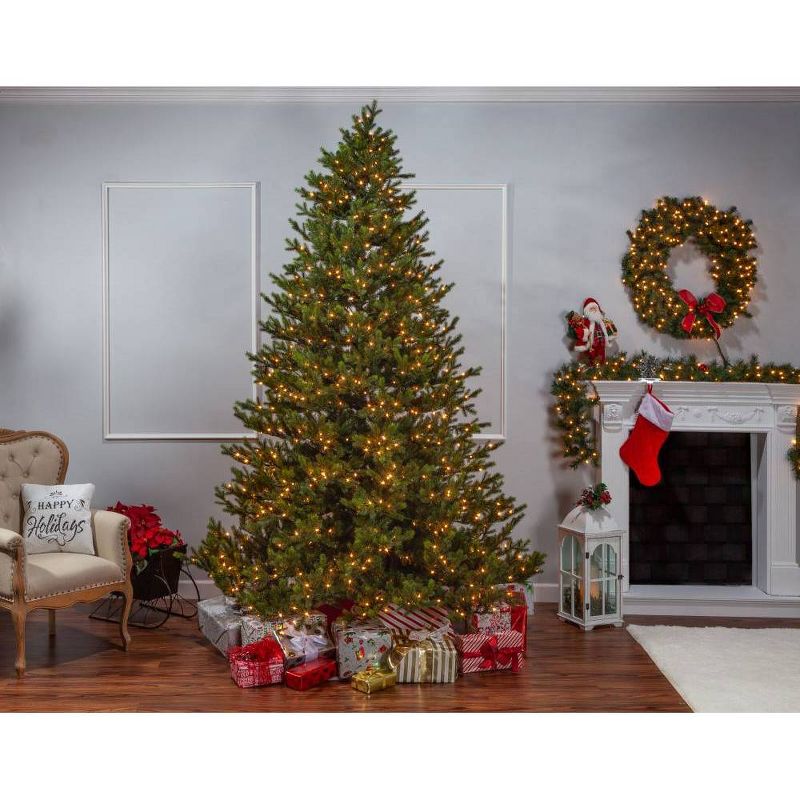 9ft Sterling Tree Company Full Natural Cut Rockford Pine with 1050 Clear Lights Artificial Christmas Tree