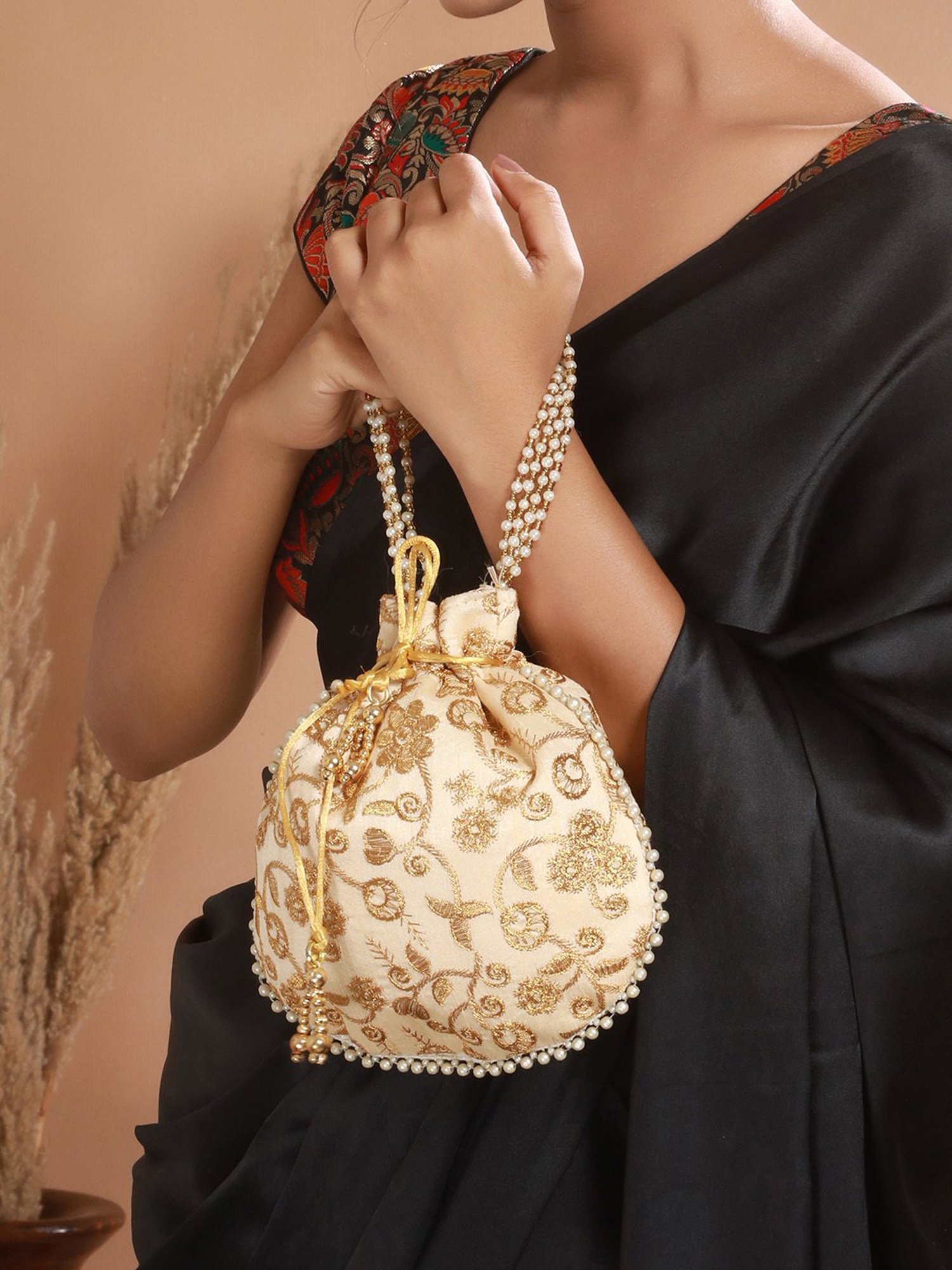 Aatmana Golden Embellished Small Potli