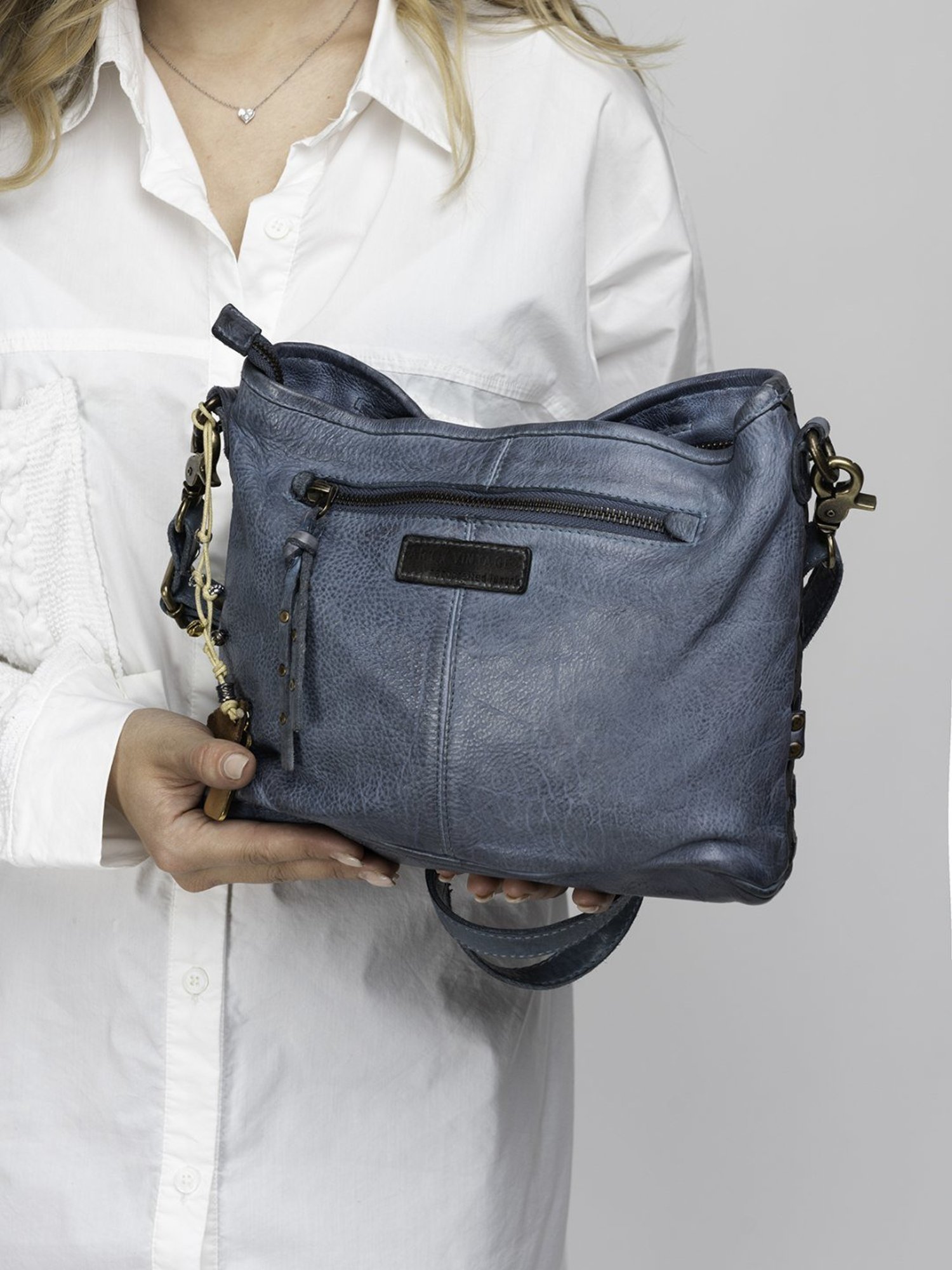 Art N Vintage Elde Blue Leather Textured Medium Sling Handbag