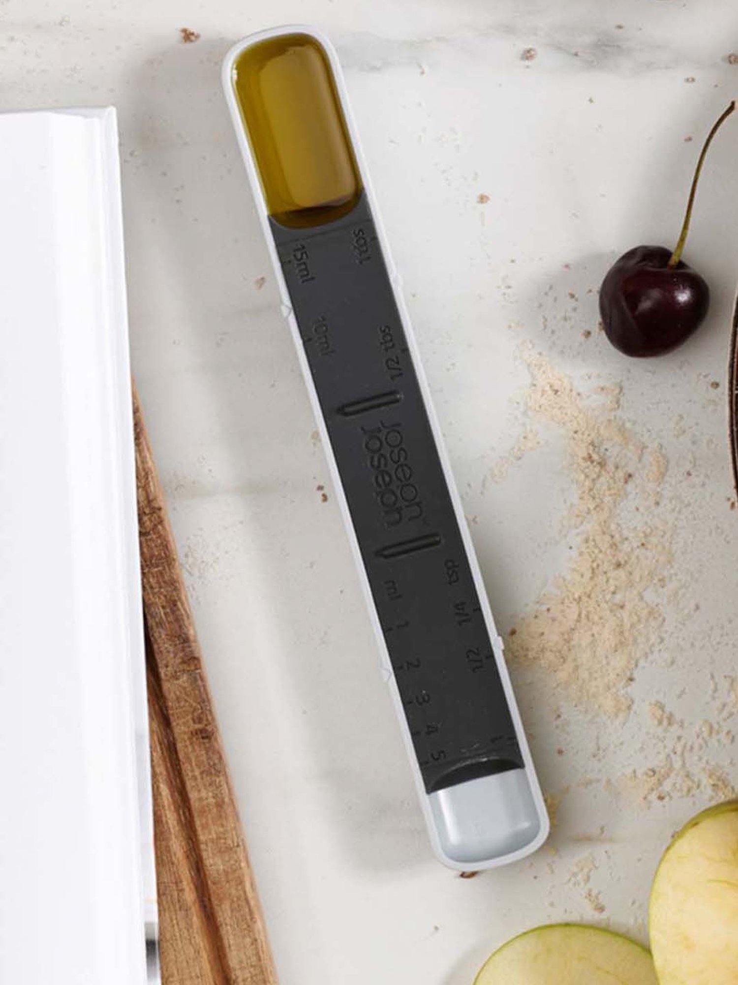 KitchenCraft Black Plastic Magnetic Measuring Cup - Set of 4