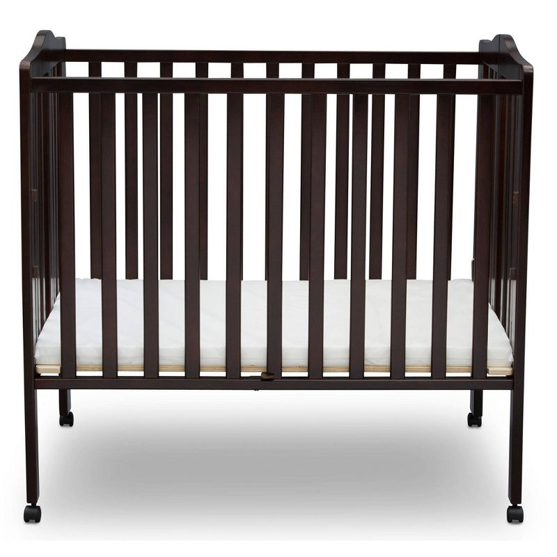 Delta Children Folding Portable Mini Baby Crib with 1.5'' Mattress, Greenguard Gold Certified - Dark Chocolate