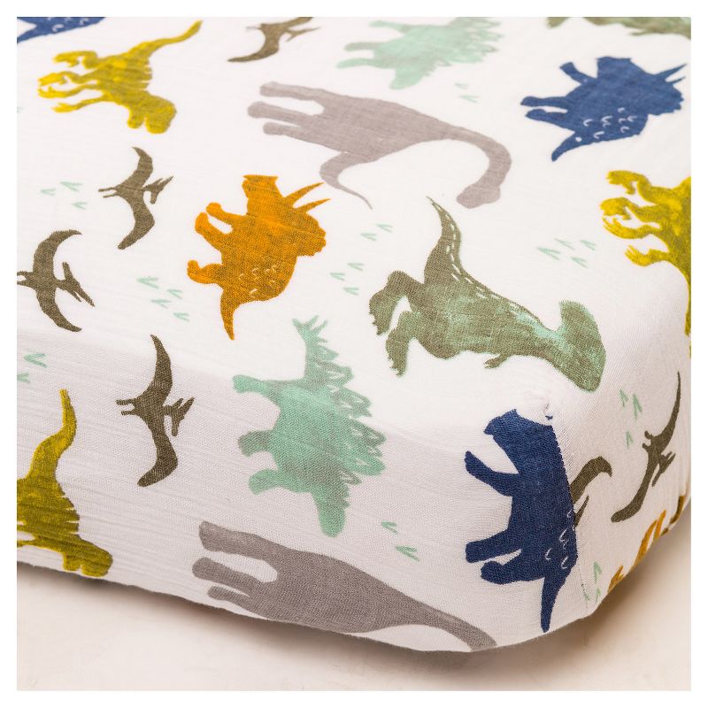 Little Unicorn Cotton Muslin Fitted Crib Sheet - Dino Friends