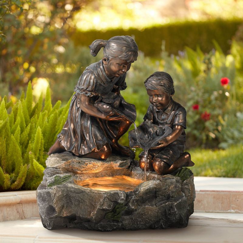 John Timberland Outdoor Floor Water Fountain with Light 23 1/2" High Cascading Girl and Boy with Lily Pad Yard Garden Patio Deck