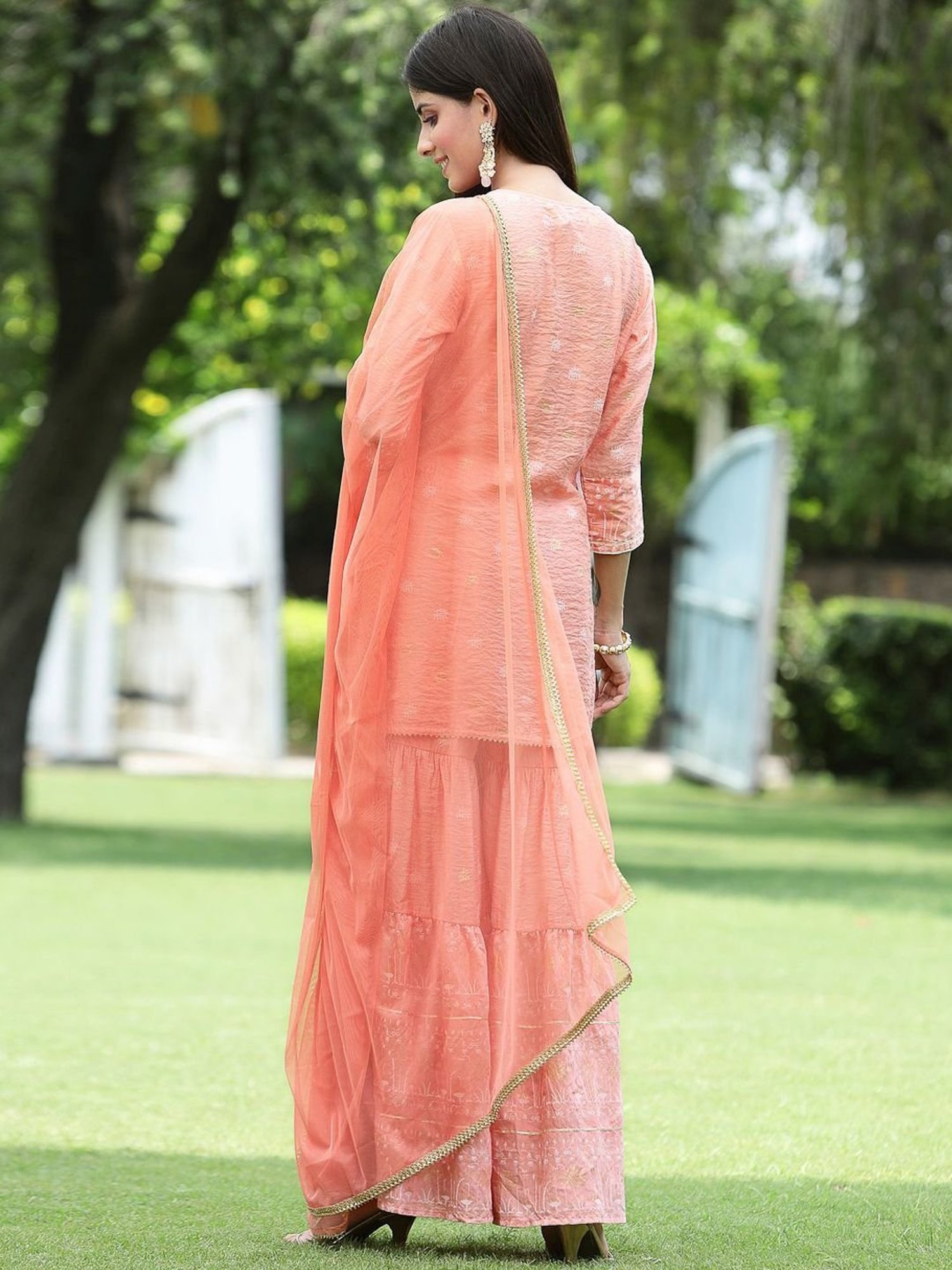 Juniper Peach Ethnic Motif Printed Viscose Muslin Kurta Sharara & Net Dupatta Set