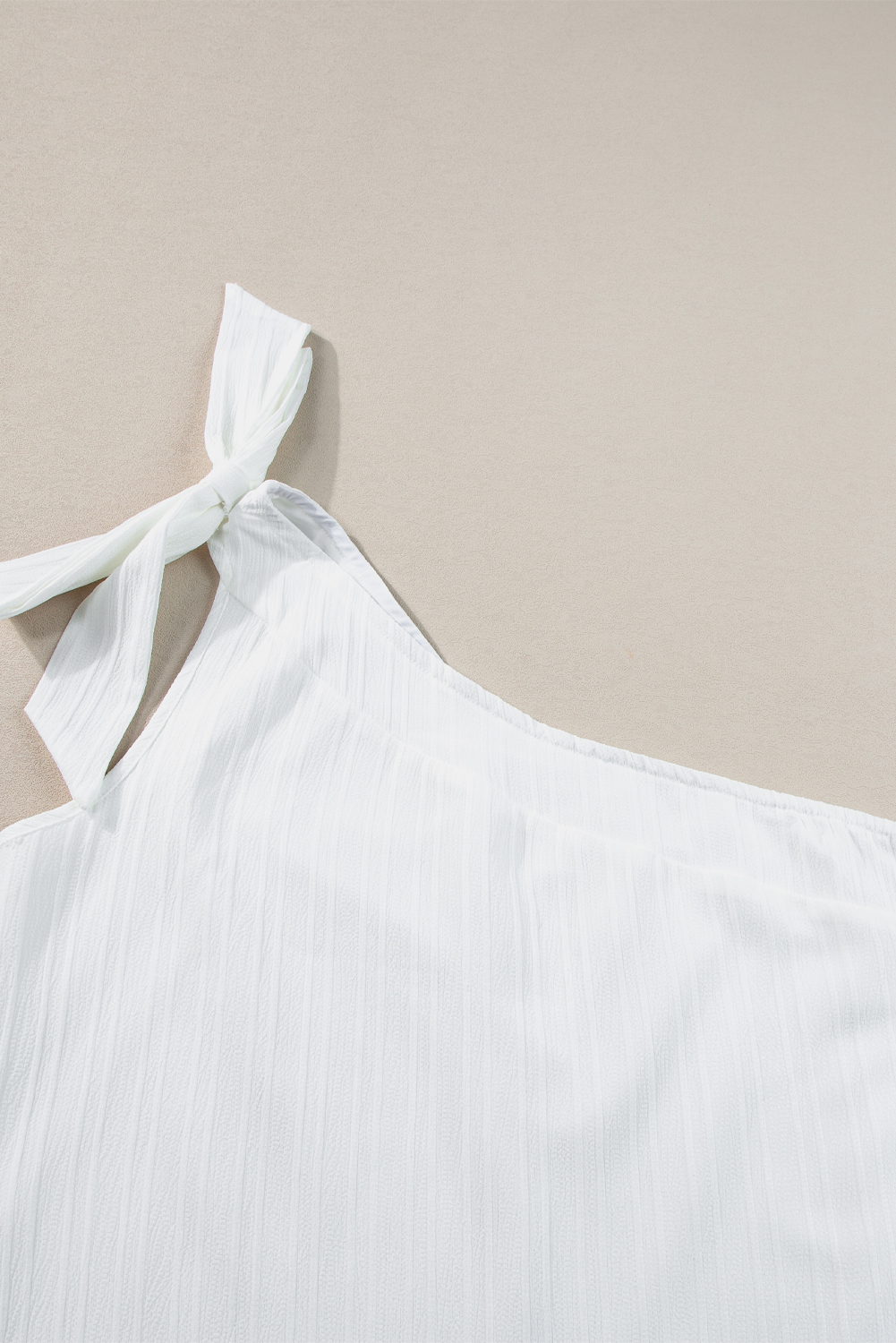 White Solid Color Asymmetrical Knot Textured Sleeveless Shirt